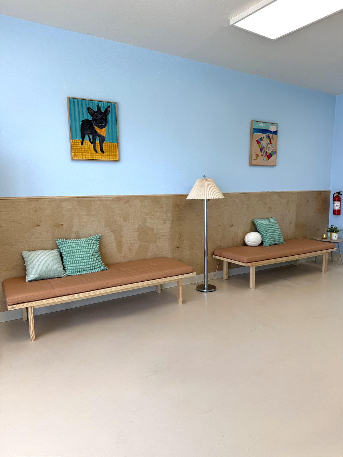 Kokoni Pet Salon waiting lounge with dog paintings